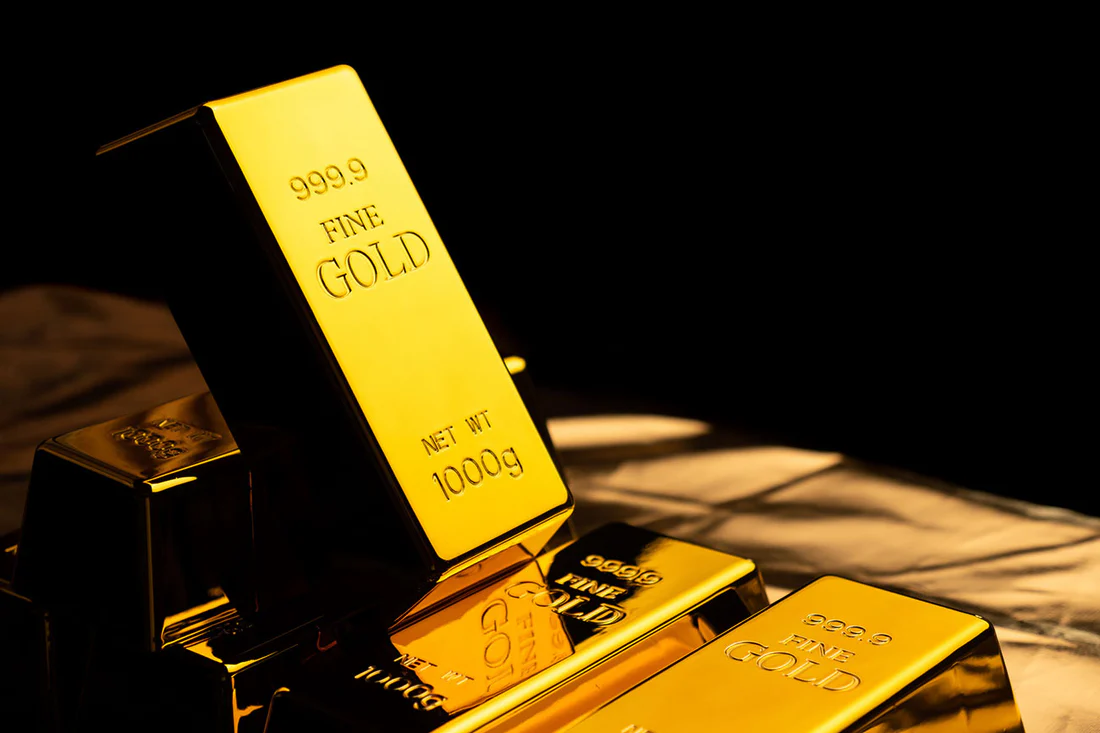 a row of gram fine gold bullion bars